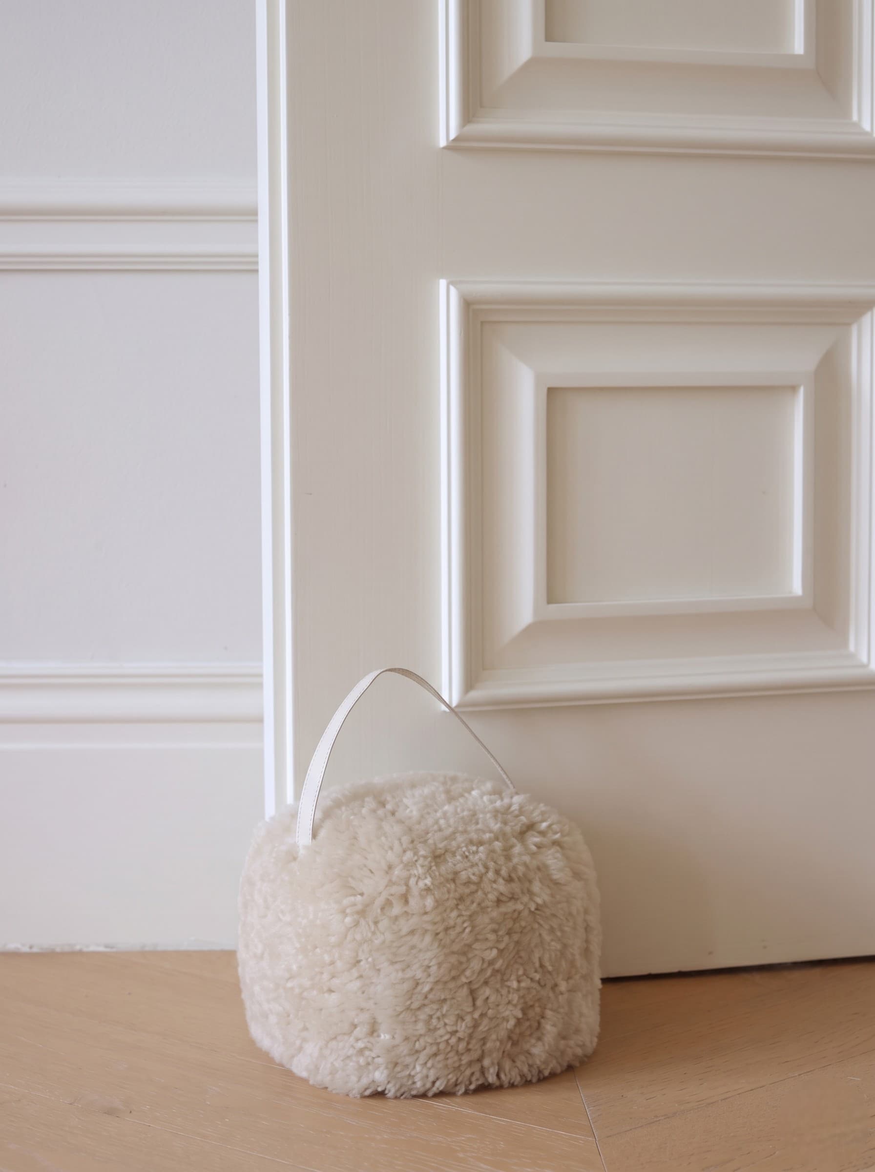Butoir de porte en peau lainée tondue