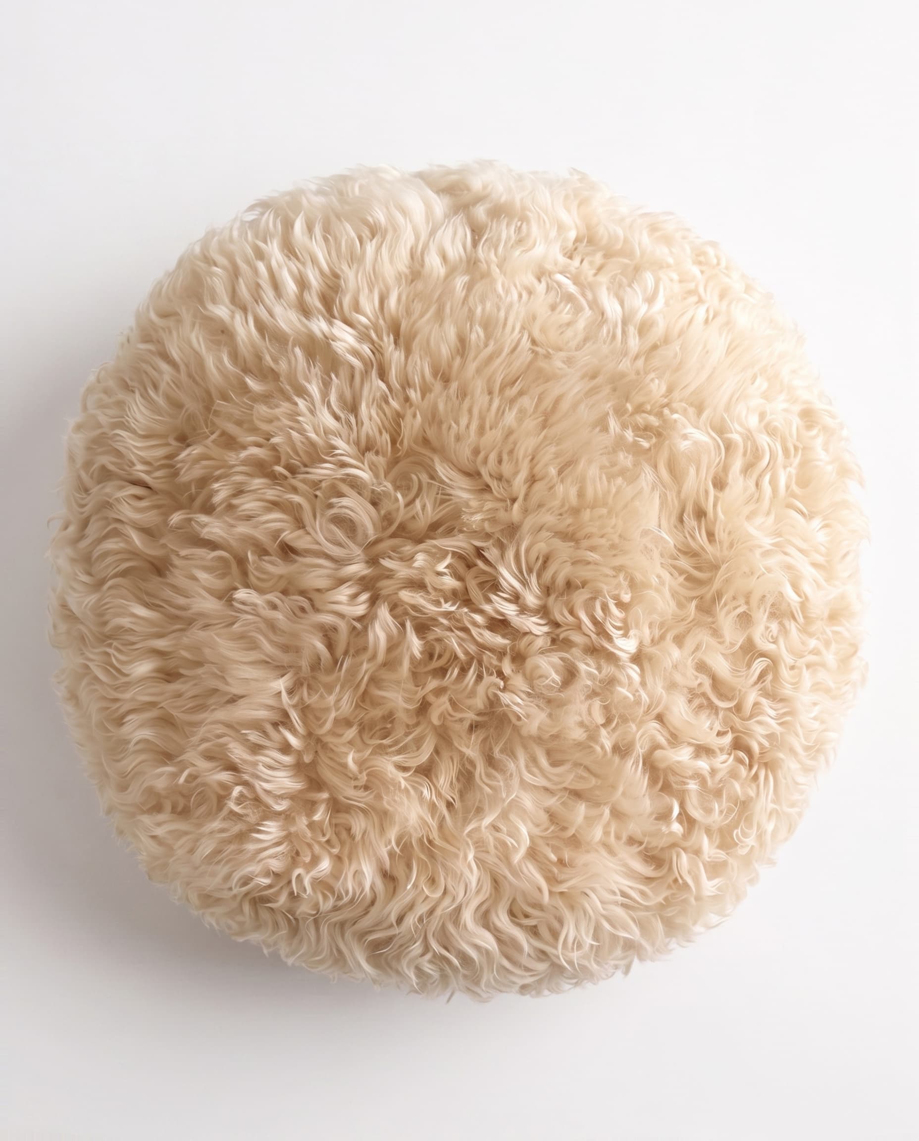Coussin en peau de mouton — style islandais — rond Ø 40 cm, poil long ondulé
