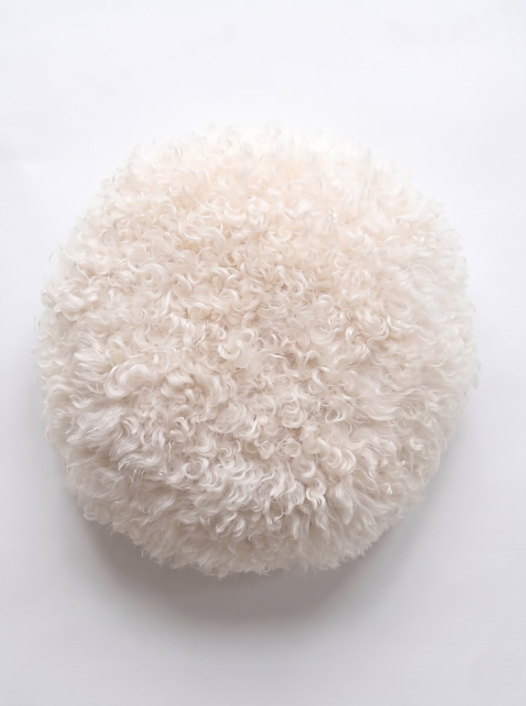 Coussin en peau de mouton de style islandais rond — coloris naturel très clair