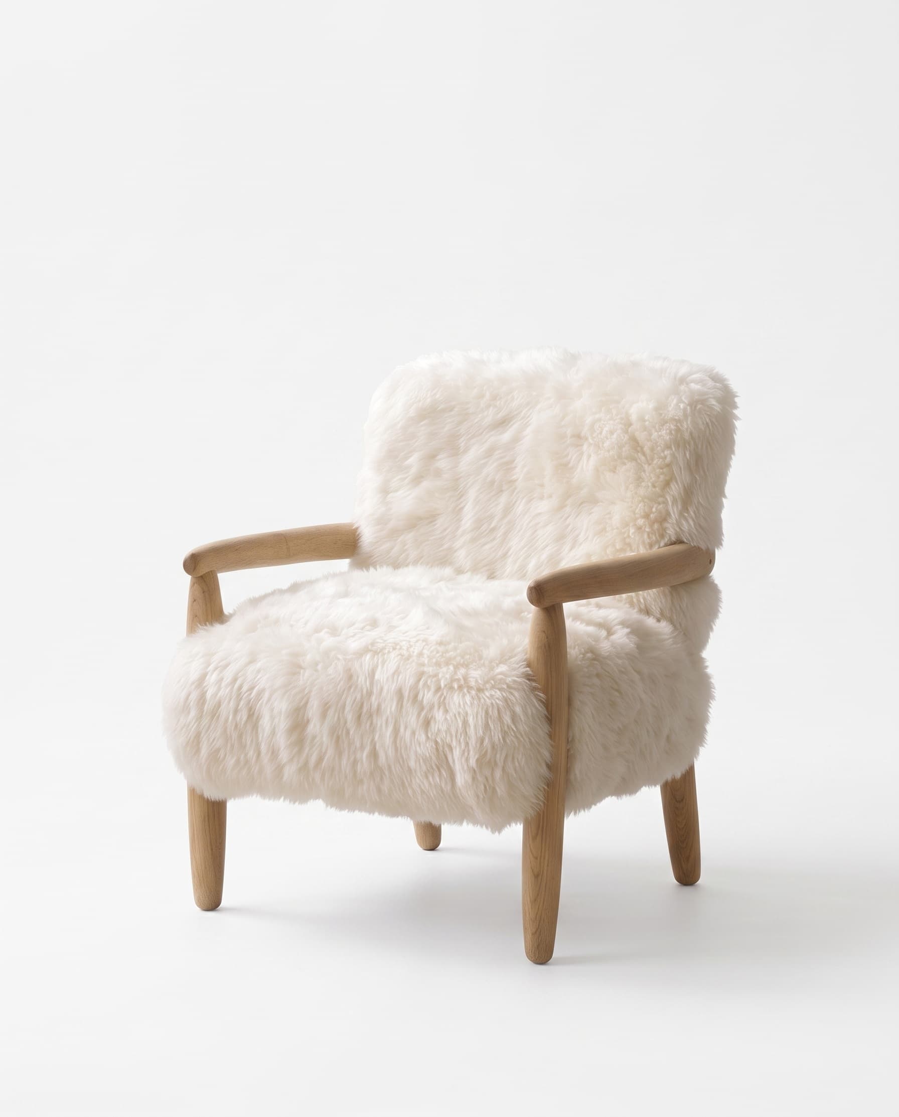 Fauteuil Arosa vu de trois quarts — profondeur d'assise et galbe du dossier