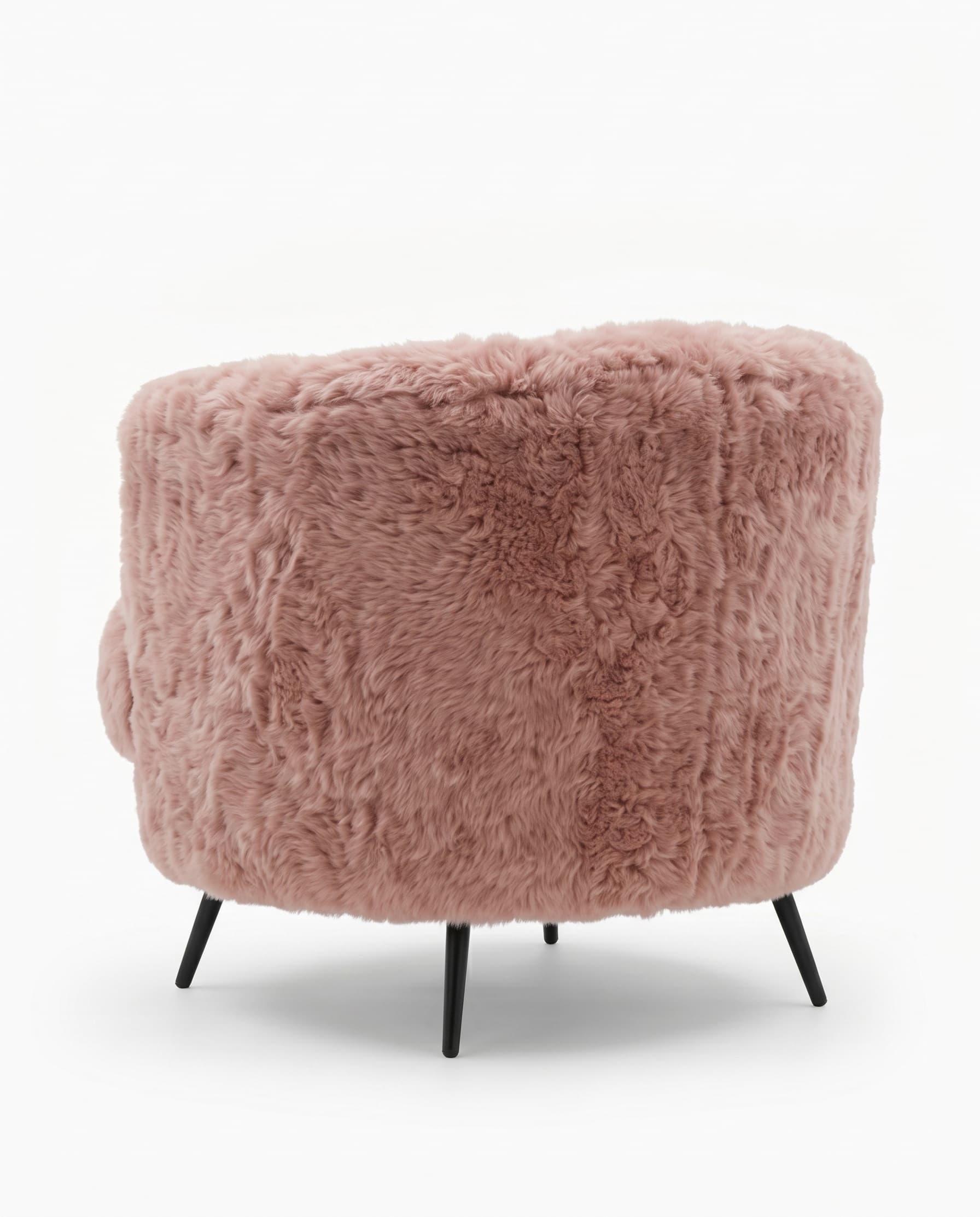 Fauteuil Sils vu de dos — coque entièrement habillée de peau lainée
